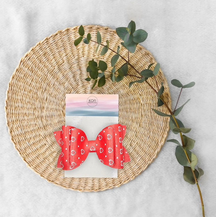 Josie | Red & Silver Heart Faux Leather Hair Bow